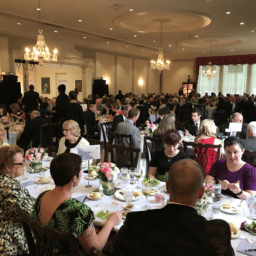 Gala attendees gather around a table